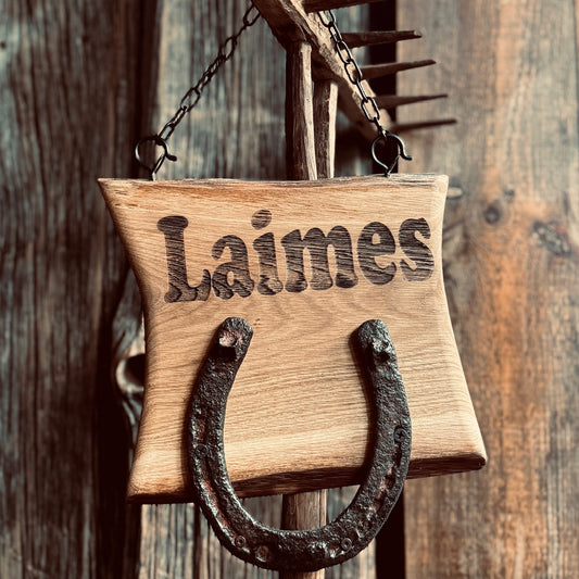 LAIMES PAKAVS, koka izkārtne ar pakavu