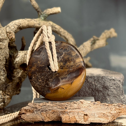 Dzintara kulons DISKS lina auklā