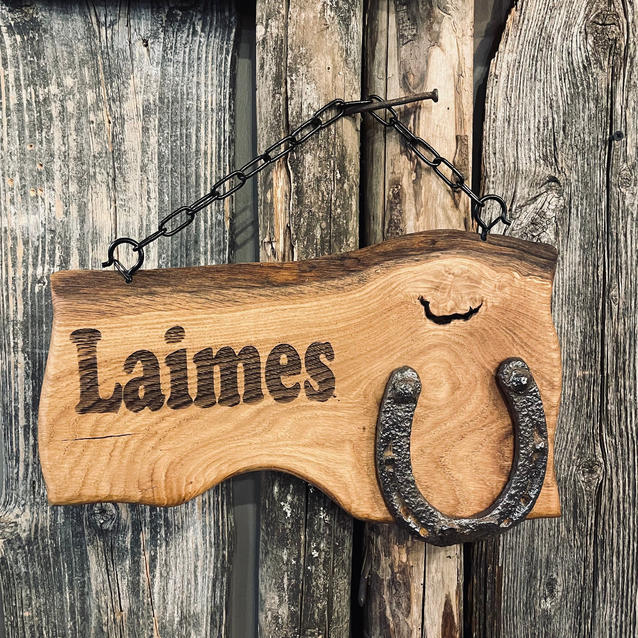 LAIMES PAKAVS, koka izkārtne ar pakavu